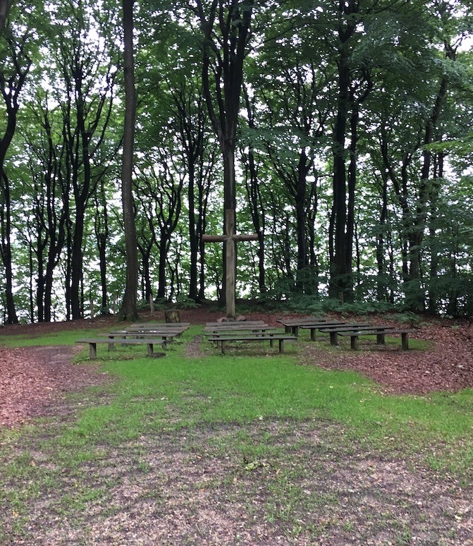 a cross in the woods