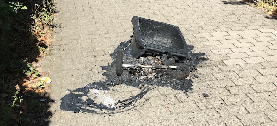 melted trash can.jpeg